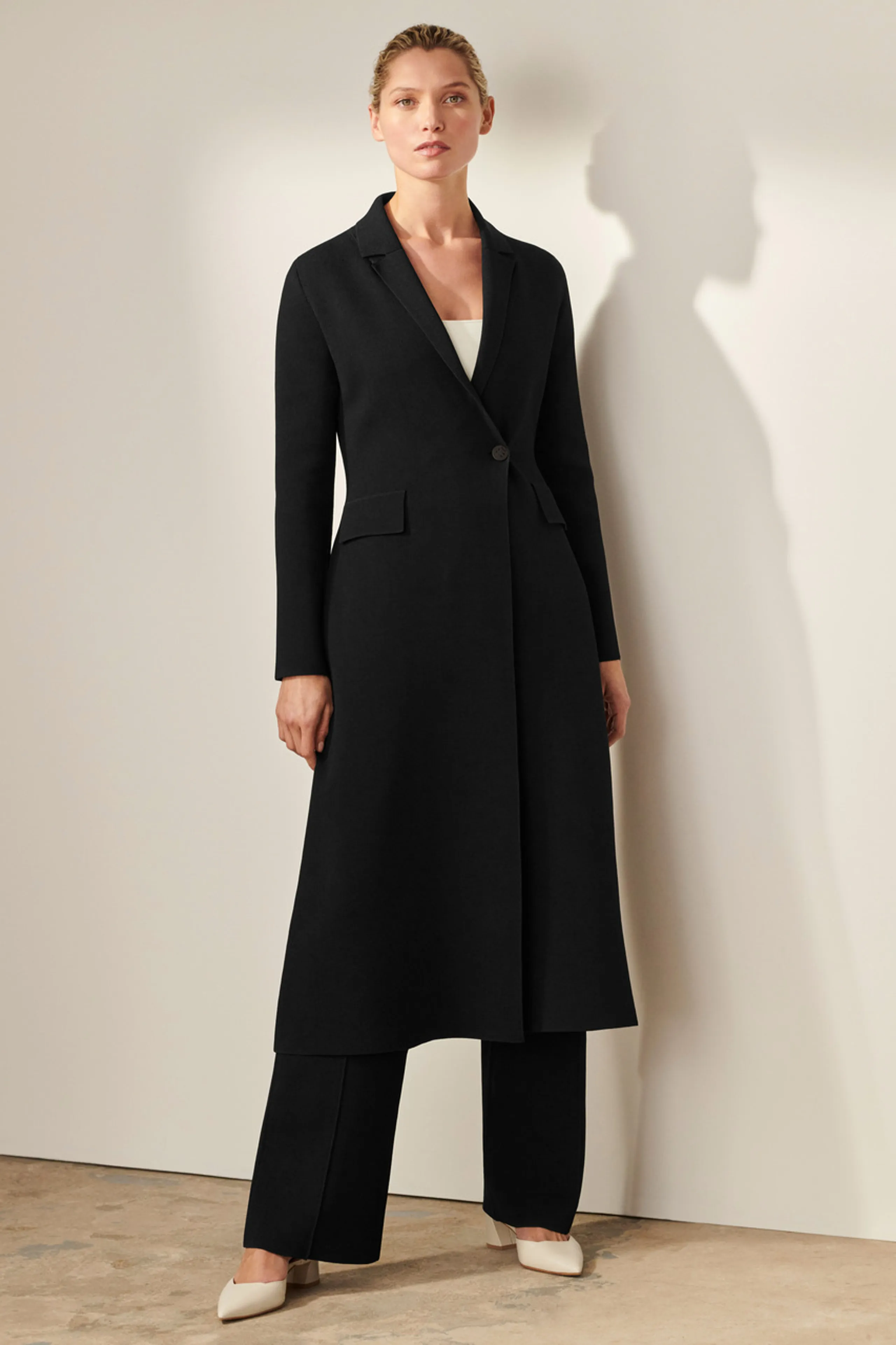 Black Knit Coat with Sculpted Design