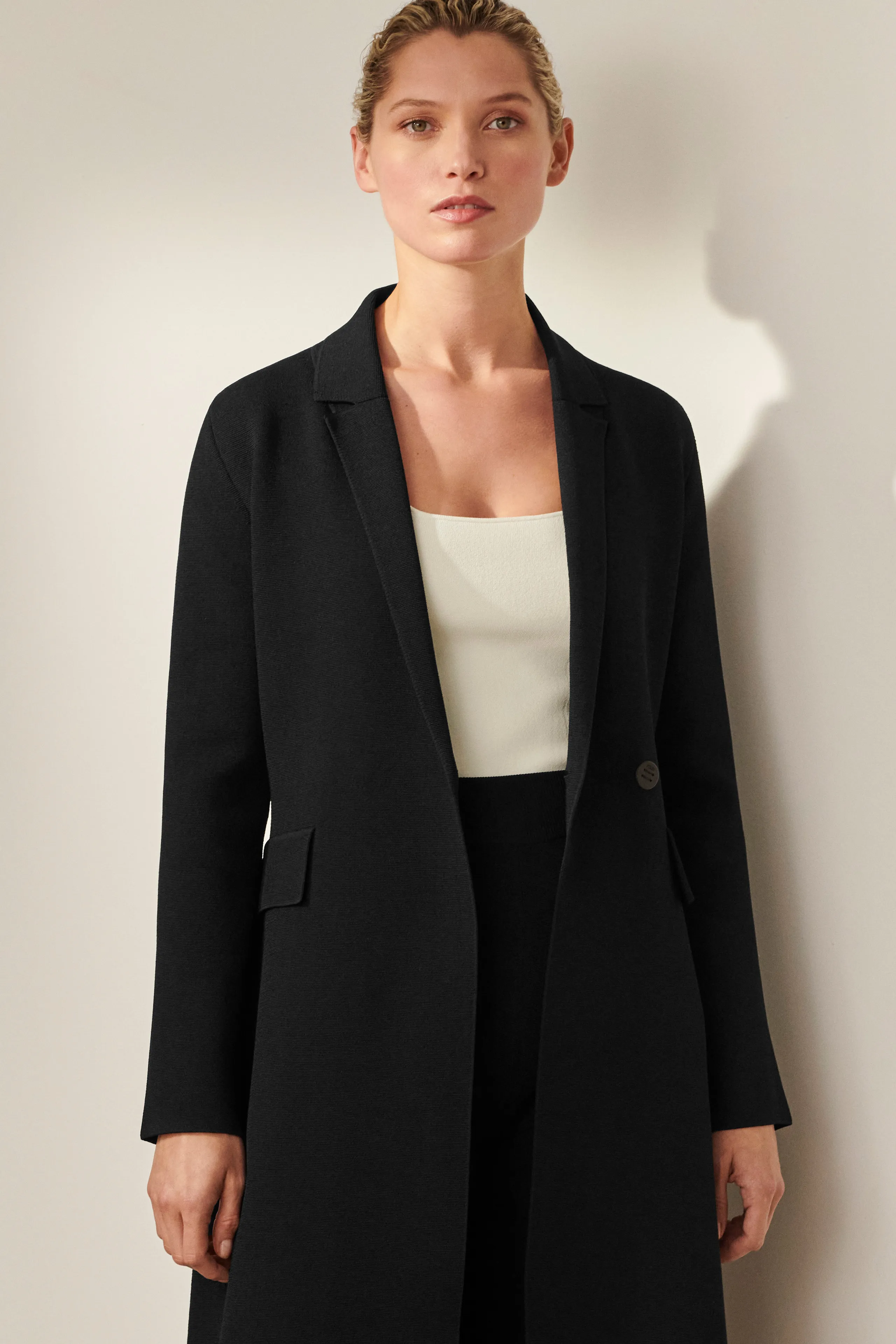 Black Knit Coat with Sculpted Design