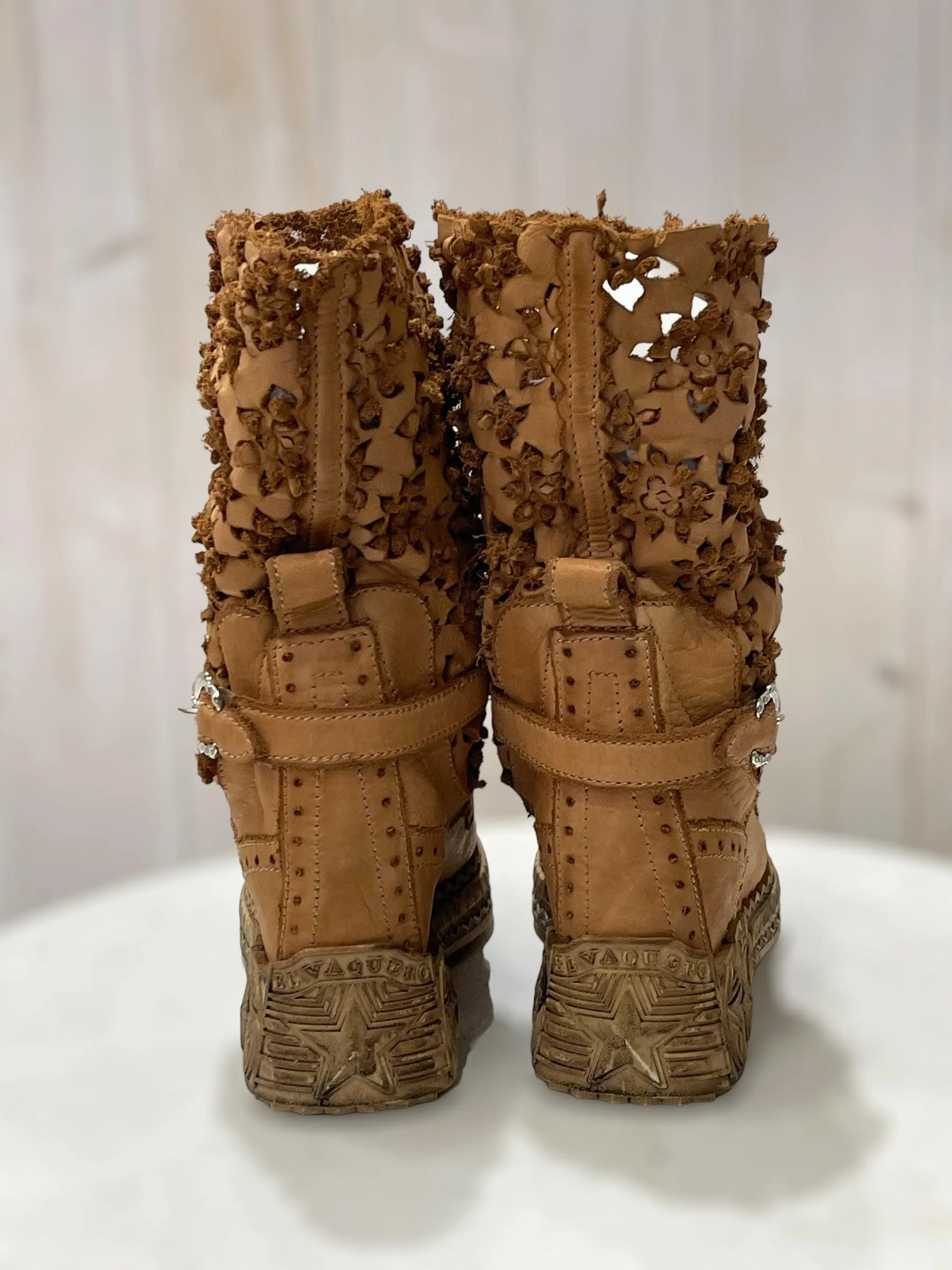 Laser-Cut Leather Wedge Booties by Fergie